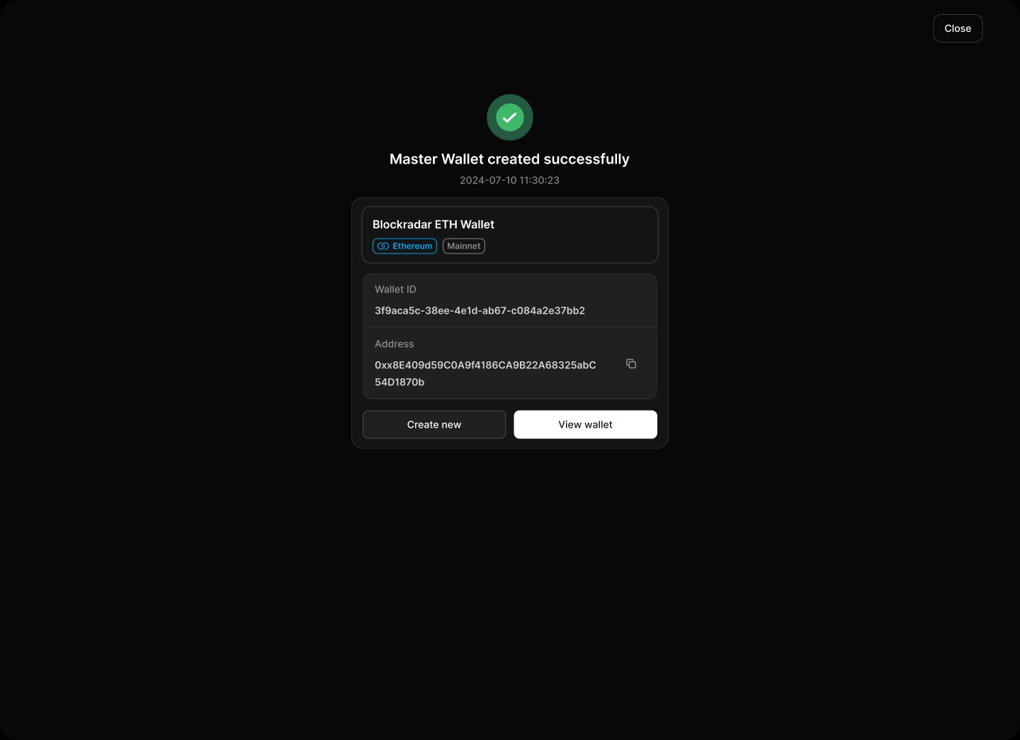 The confirmation returns the wallet ID and full address, with a copy control.